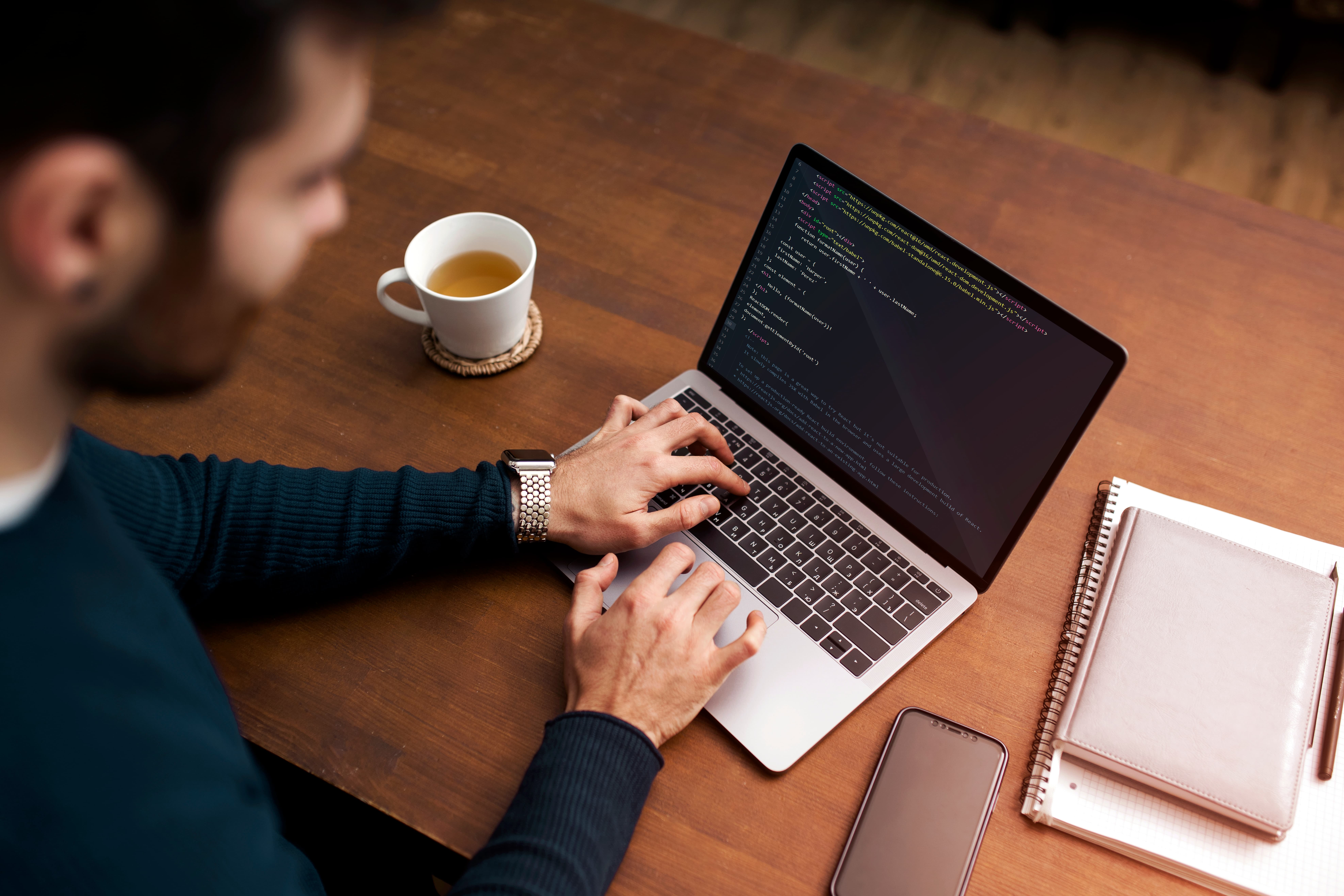 high angle man working laptop 1